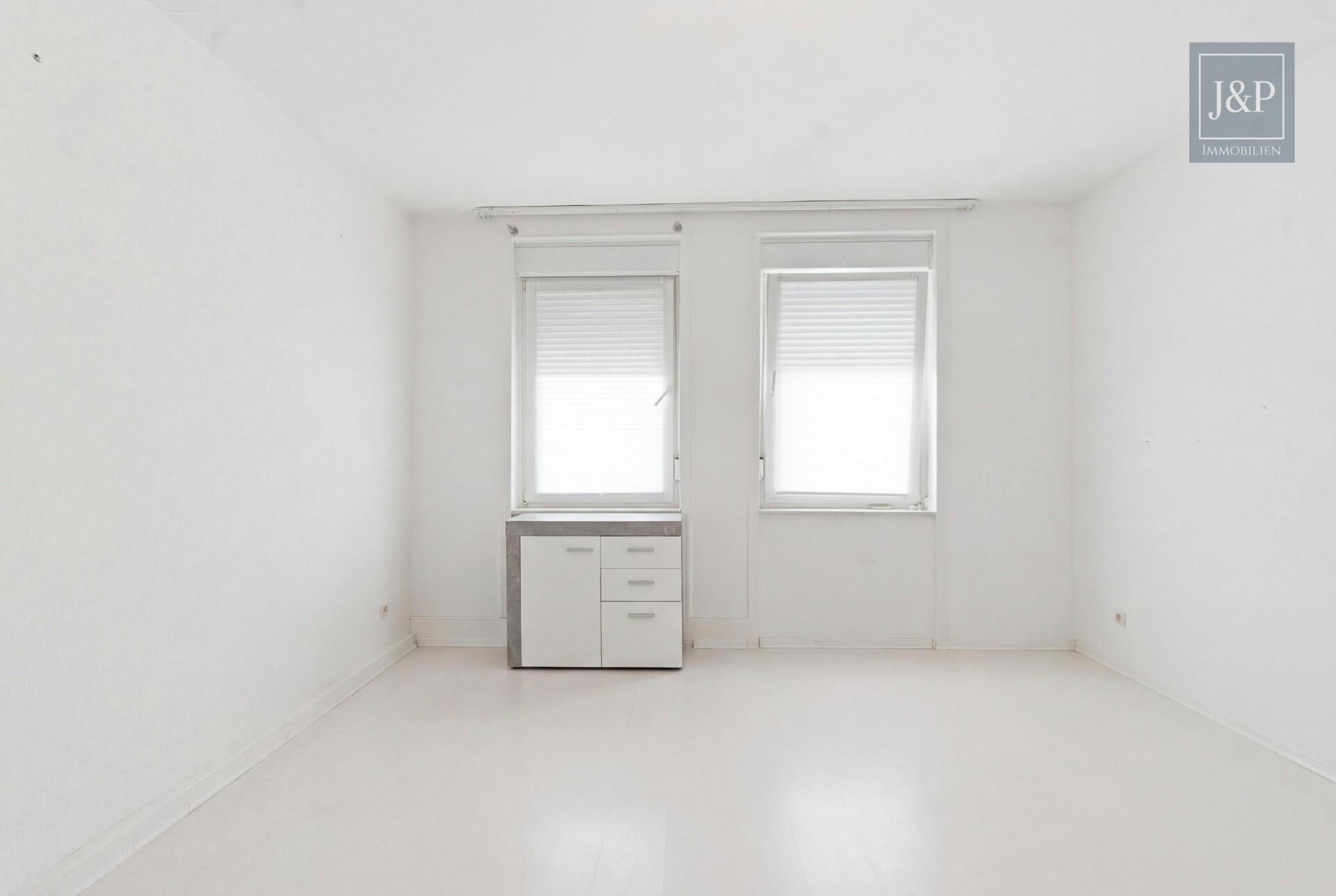 Wohn- & Geschäftshaus in Oberursel-Bommersheim mit Mieteinnahmen und viel Potenzial! - Studio OG