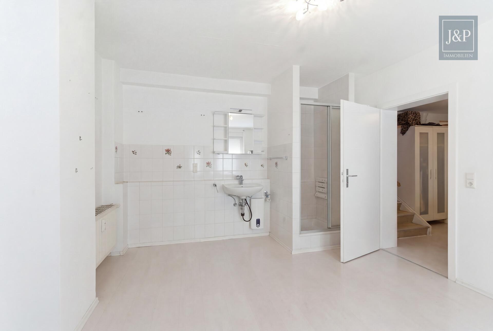 Wohn- & Geschäftshaus in Oberursel-Bommersheim mit Mieteinnahmen und viel Potenzial! - Studio OG