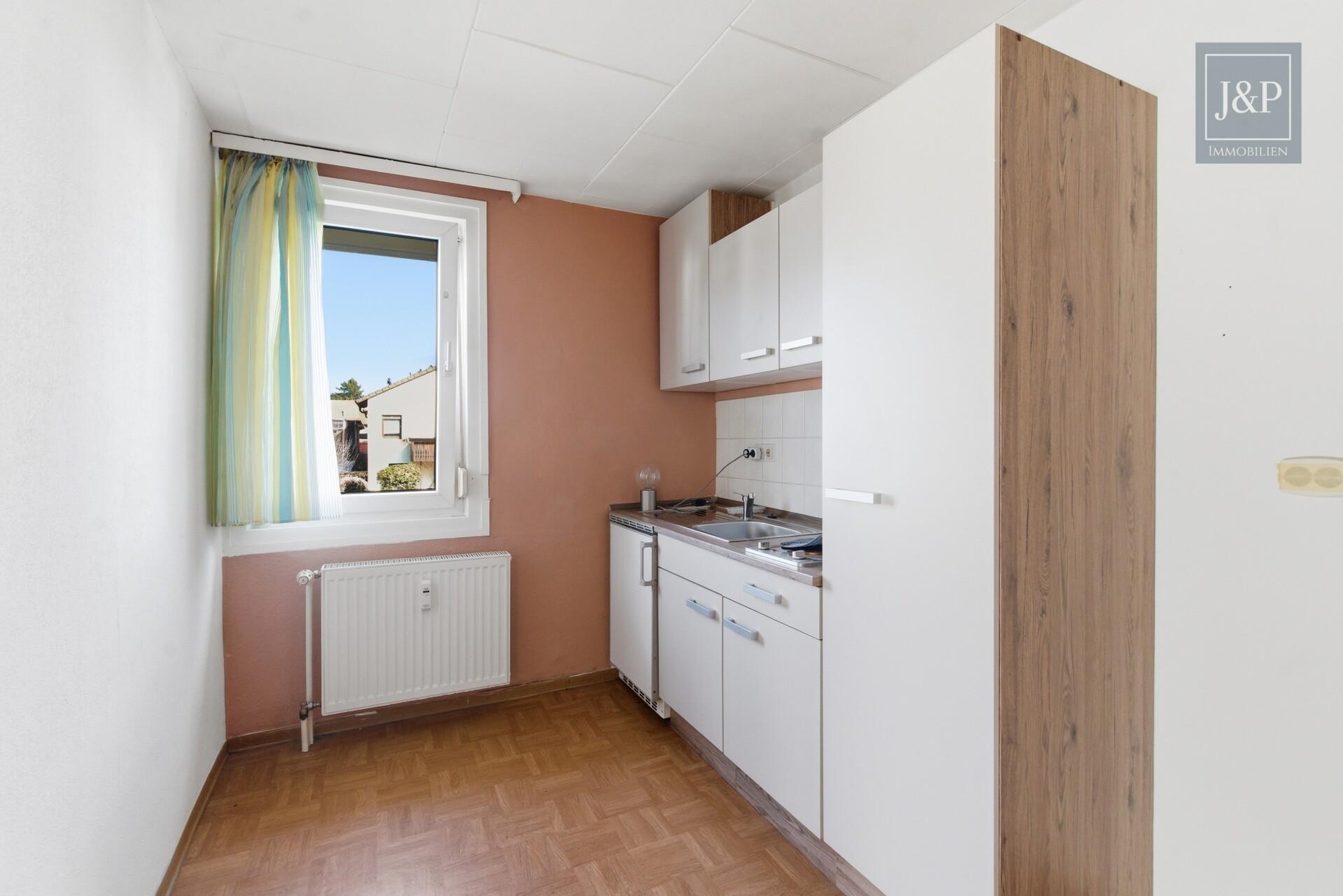 Wohn- & Geschäftshaus in Oberursel-Bommersheim mit Mieteinnahmen und viel Potenzial! - 1,5-Zimmer-Wohnung