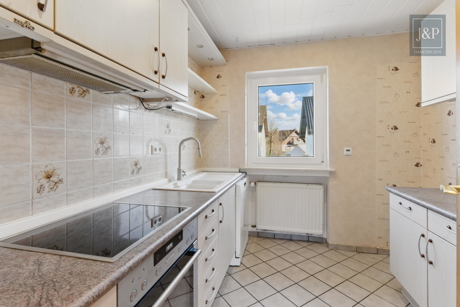 Ein Zuhause für Generationen – modernisiertes Mehrfamilienhaus in zentraler Lage von Bruchköbel! - Küche 1.OG