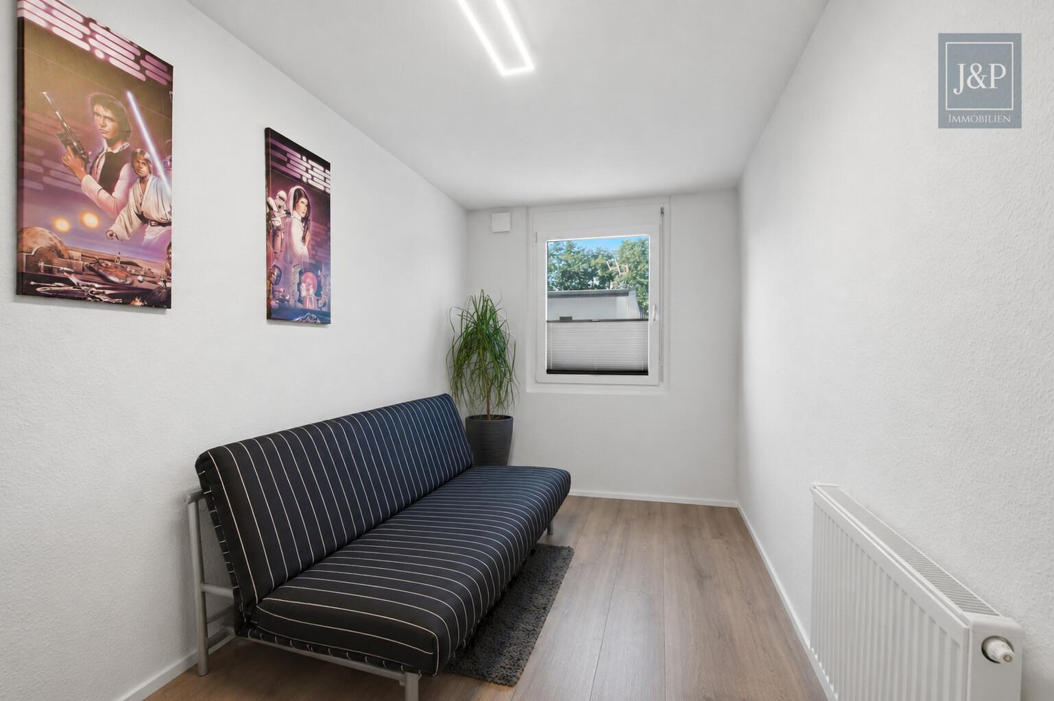 Modernes Reihenendhaus mit Terrasse, Carport & Wallbox in Nauheim - Kinderzimmer oder Büro