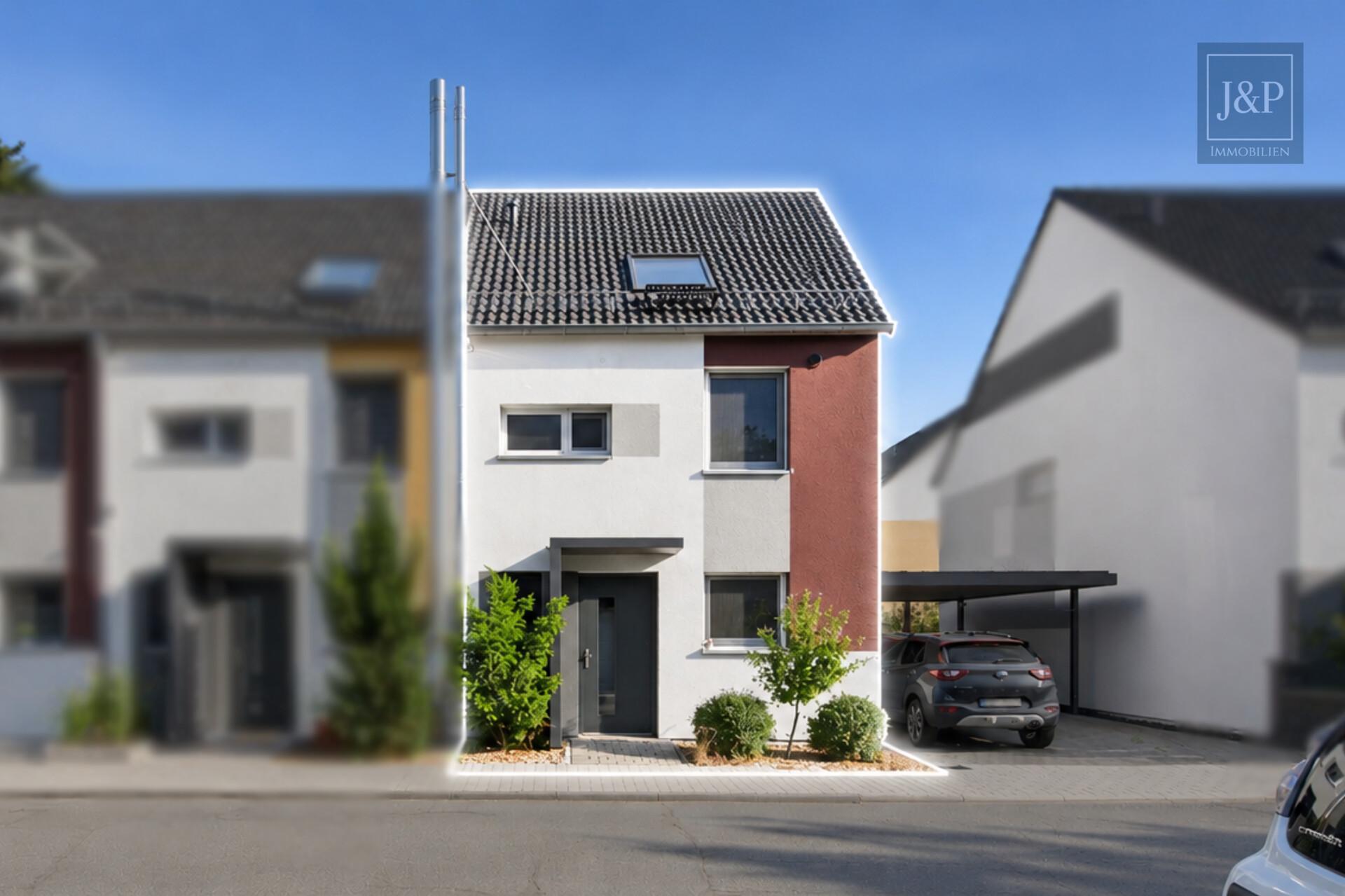 Modernes Reihenendhaus mit Terrasse, Carport & Wallbox in Nauheim - Außenansicht