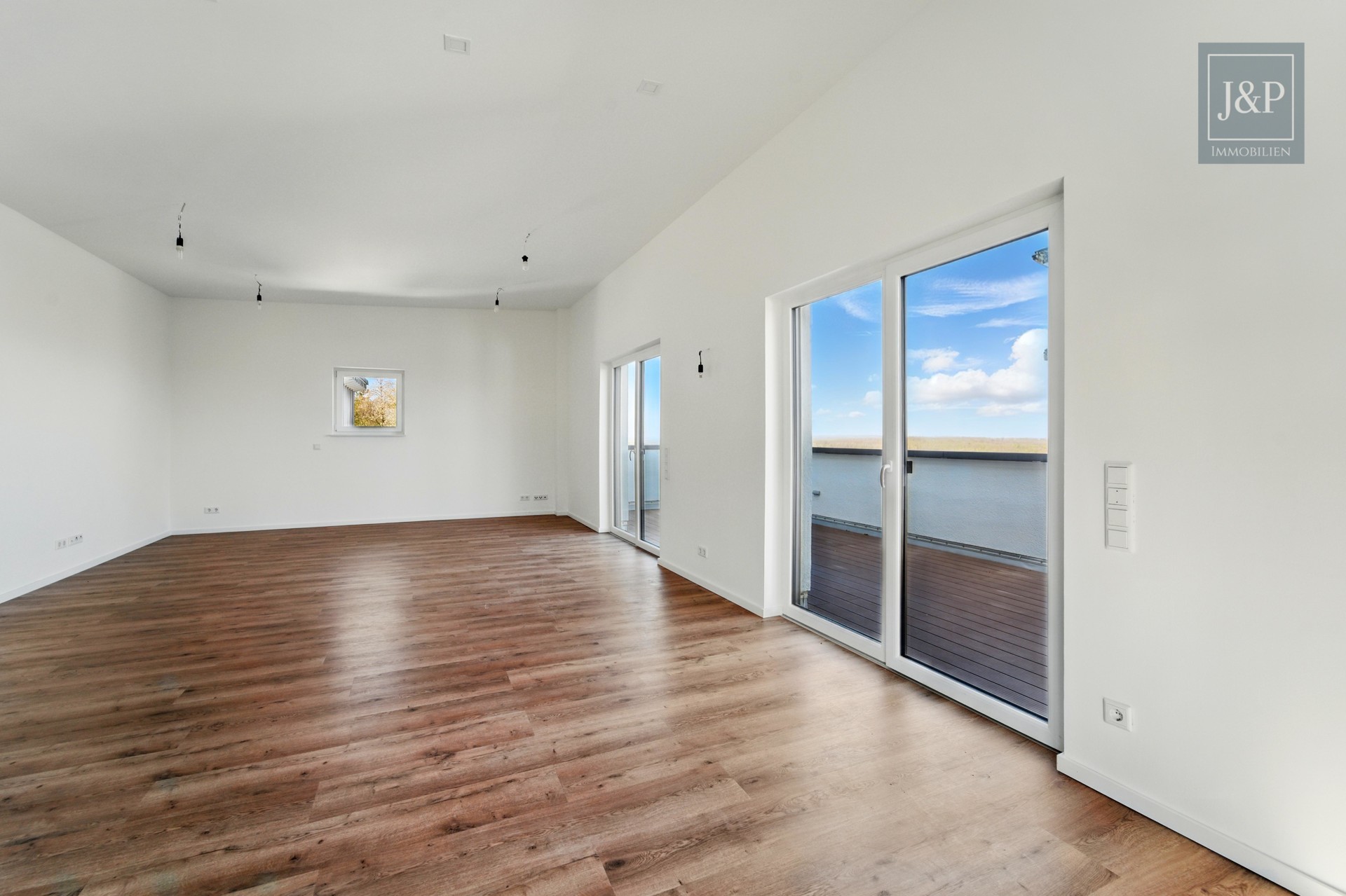 Penthouse mit Weitblick: Exklusives Wohnen über den Dächern von Butzbach - Wohn-/Essbereich