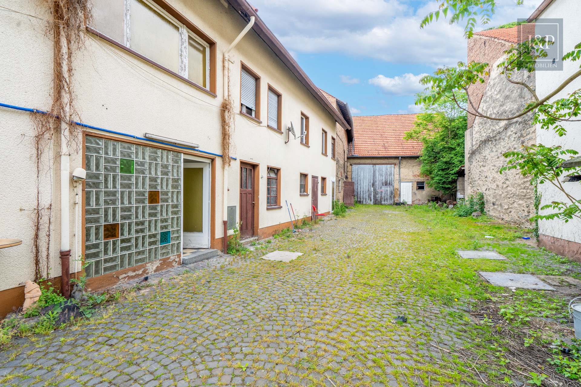 Projektierung in Eschborn: Zentrales Baugrundstück mit Baugenehmigung und Bestandsobjekt! - Abrissgrundstück