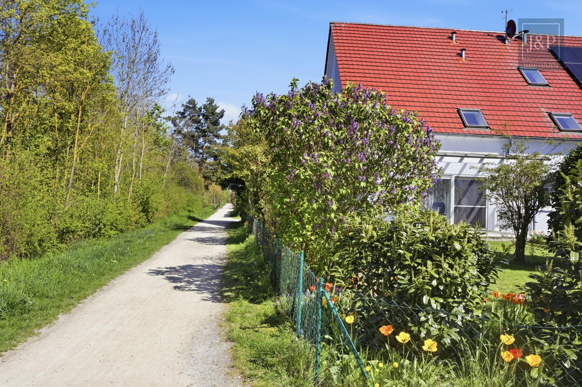 Naturnahes Wohnglück in Bestlage - nachhaltiges Wohnen mit City-Anschluss! - Rückansicht