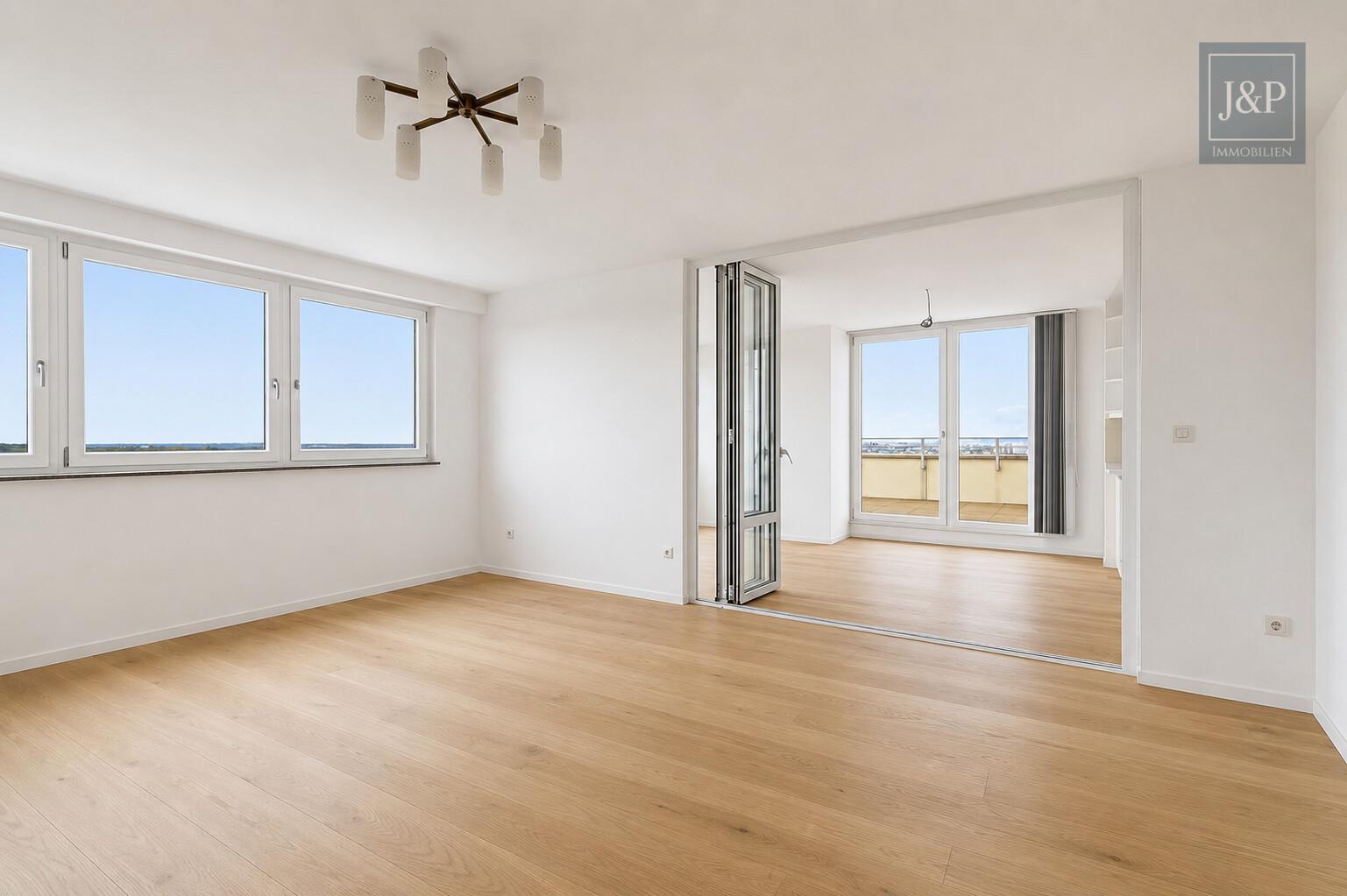 Beeindruckende Penthouse-Wohnung mit Skylineblick und zwei Terrassen! - Wohnzimmer (Visualisierung)