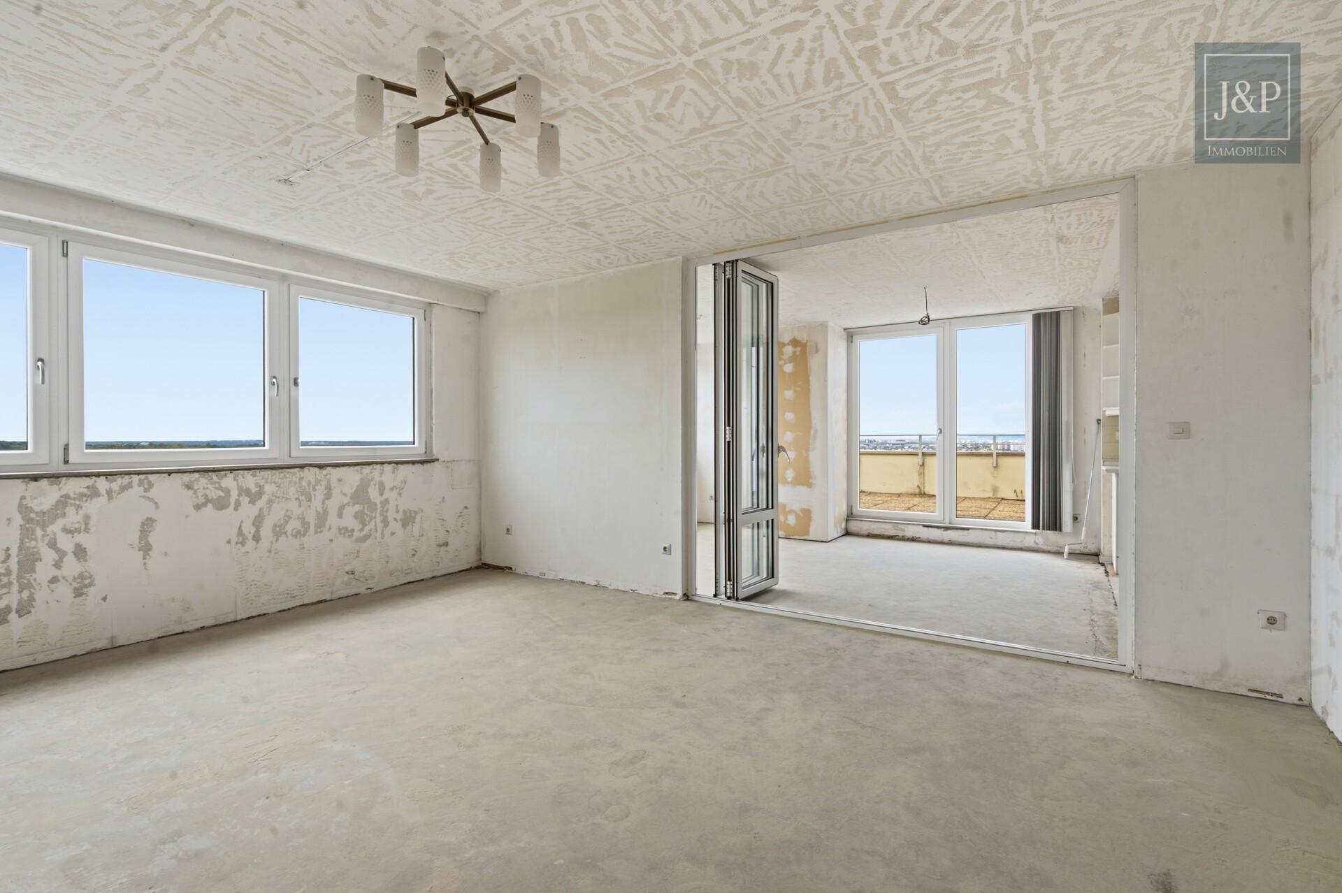 Beeindruckende Penthouse-Wohnung mit Skylineblick und zwei Terrassen! - Wohnzimmer