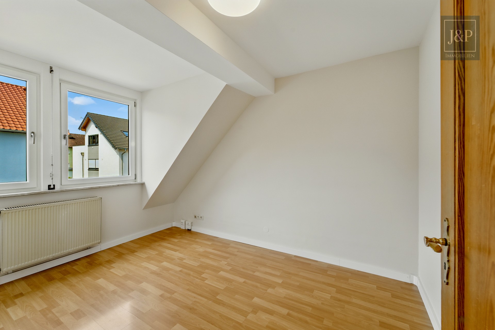 Maisonette-Wohnung mit Dachterrasse und toller Aussicht über Eschborn - Schlafzimmer 2 1.OG
