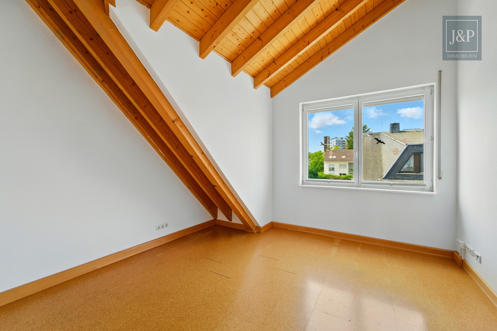 Maisonette-Wohnung mit Dachterrasse und toller Aussicht über Eschborn - Schlafzimmer DG
