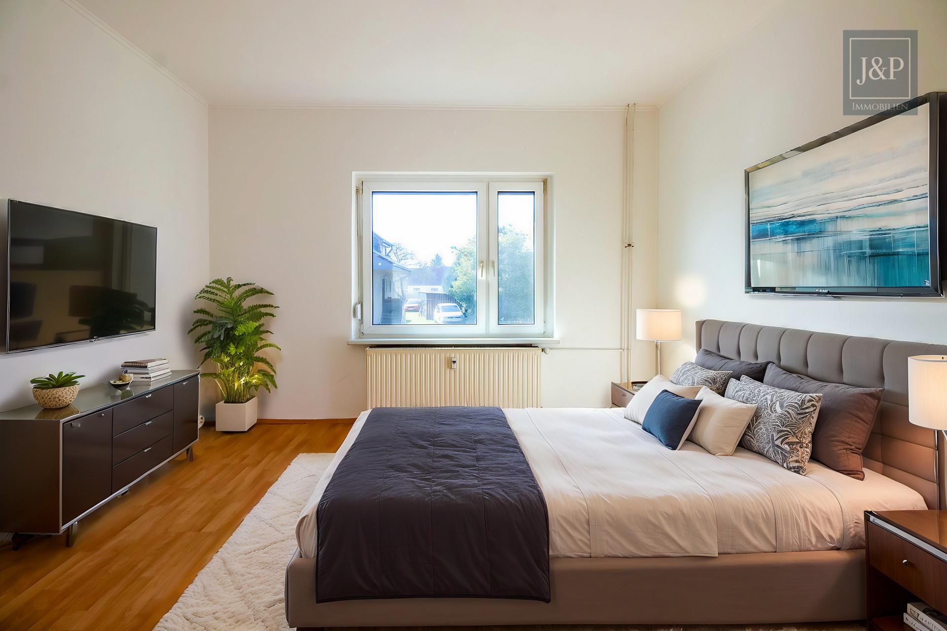 Zweifamilienhaus mit großem Garten, Terrasse & Garage – ideal für Familien und Kapitalanleger - Schlaf/Wohnzimmer
