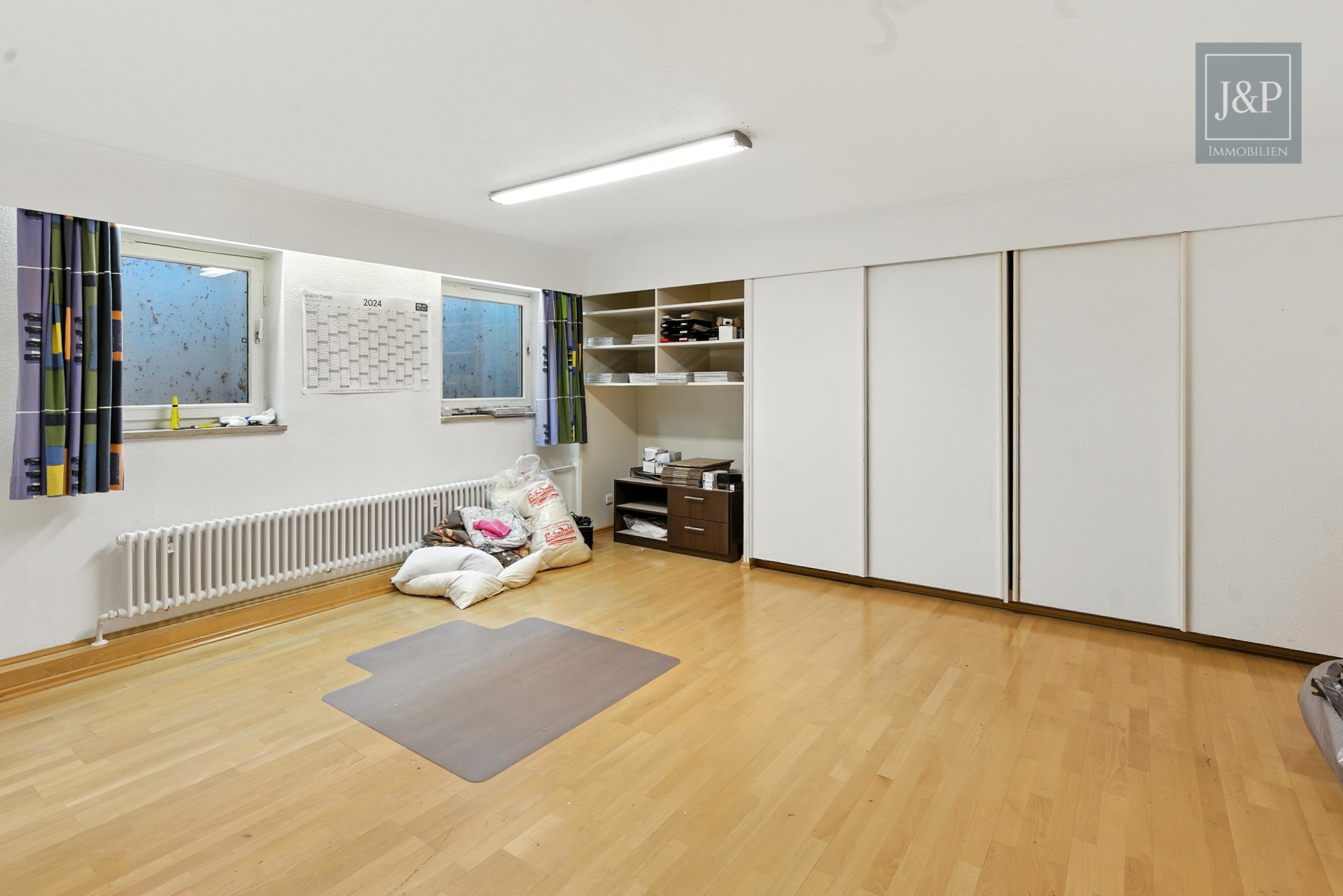 Bestlage von Goldbach! – Familienidylle trifft auf architektonischen Charme - UG Hobbyzimmer 1