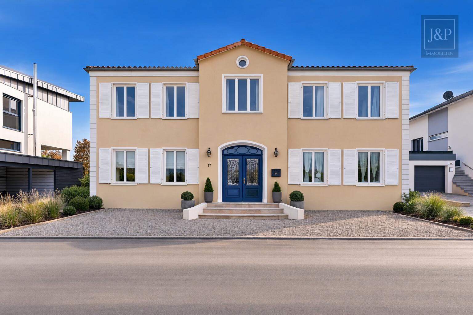 Einzigartiges Wohnkonzept nach Feng Shui – KfW-40 Anwesen inkl. Büro / ELW in Feldrandlage - Aussenansicht