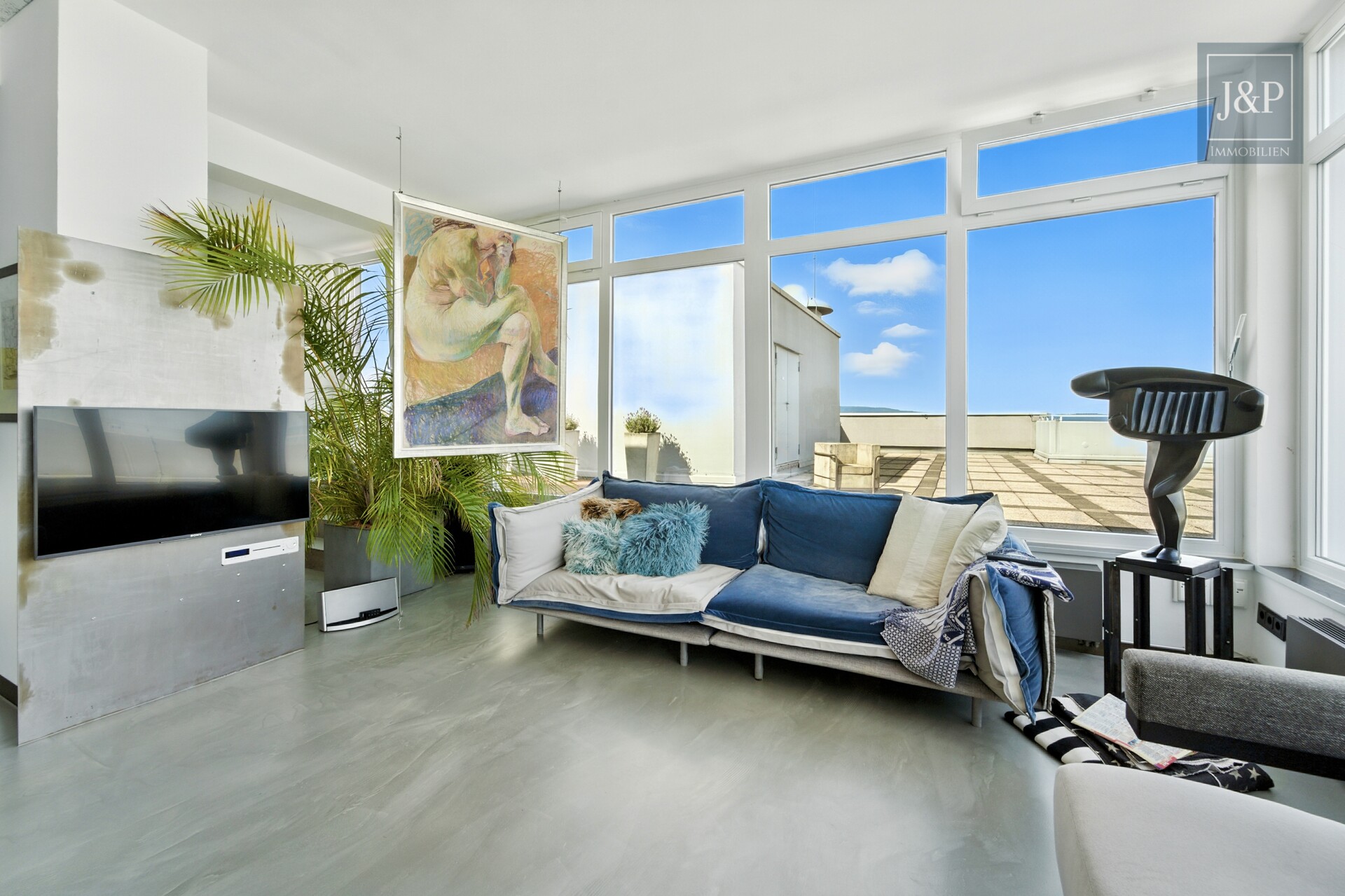 Luxus über den Dächern Eschborns - exklusives Architekten-Penthouse mit spektakulärem Ausblick - Wohnbereich