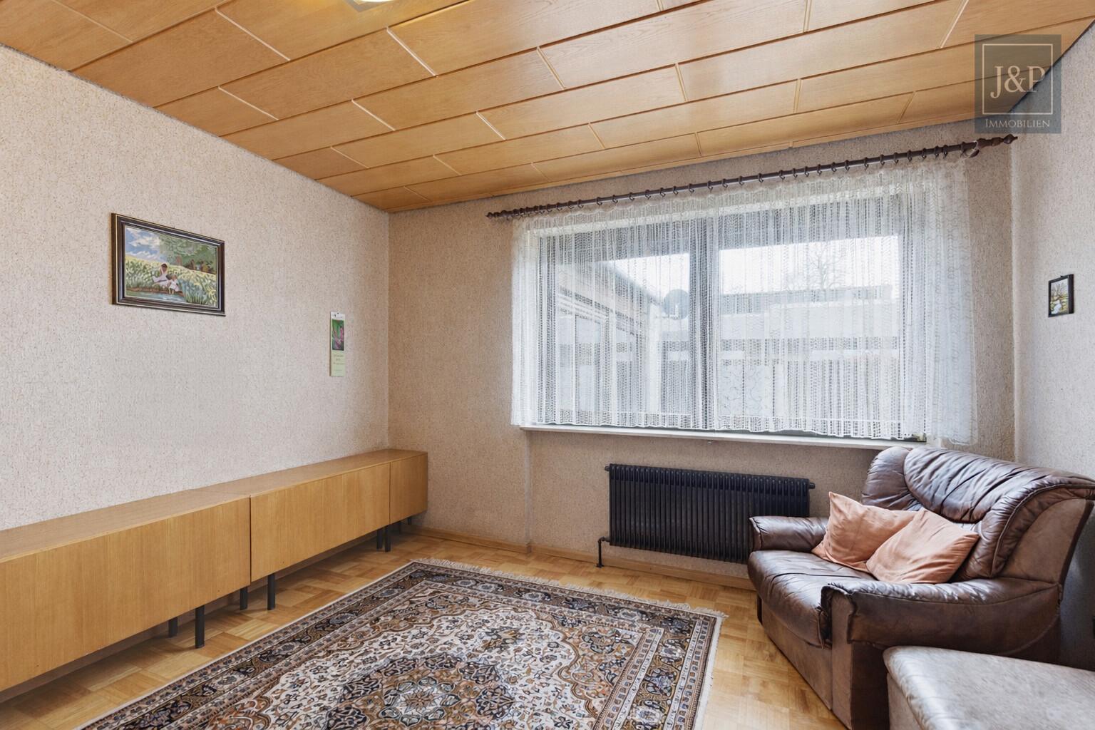 Familien-Bungalow in ruhiger Lage – Garage, Sauna & schöner Garten! - Schlafzimmer 1