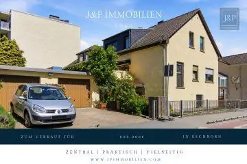 Zweifamilienhaus inkl. ausgebaute Parterre in zentraler Lage von Eschborn mit Terrasse & 2 Garagen, 65760 Eschborn, Zweifamilienhaus